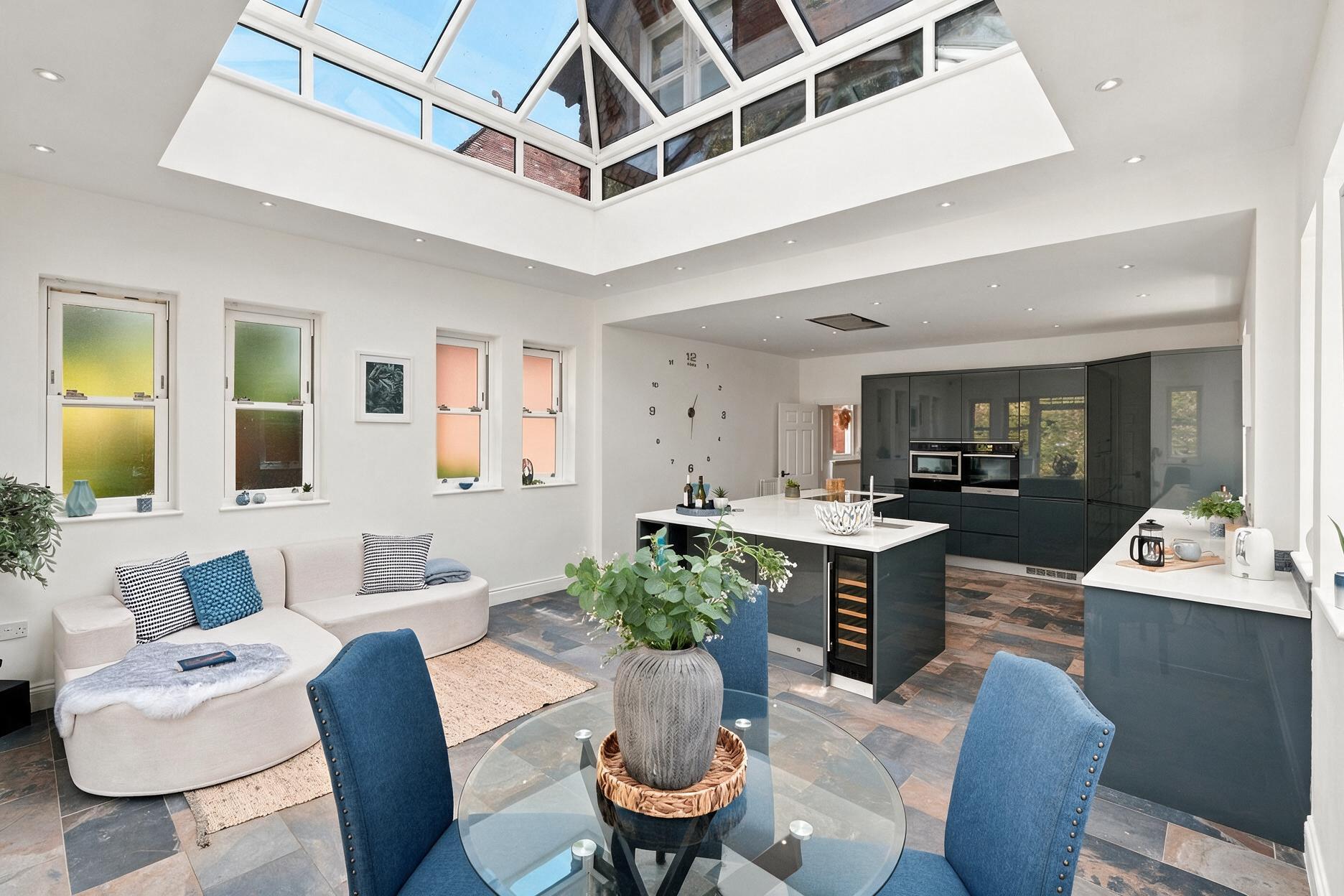 Bright open-plan living and kitchen space in a staged holiday let